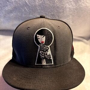 New Era Gray and Black Keyhole Design Hat